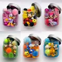 four jars filled with different types of toys