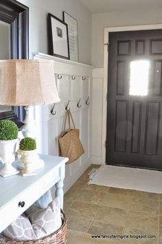 the entryway is clean and ready for us to use as a storage area in the house