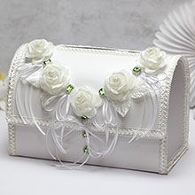 a white purse with flowers on it