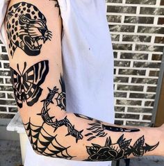 a man with a tattoo on his arm