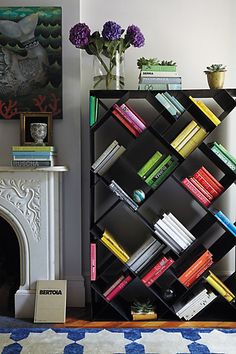 a bookshelf in the corner of a living room