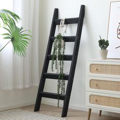 a ladder leaning up against a wall in a room with a rug on the floor