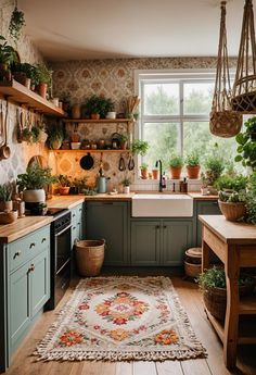 a kitchen filled with lots of plants next to a sink and stove top mounted oven