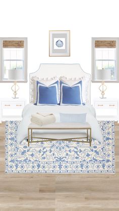 a bed with blue and white pillows on top of it next to two framed windows