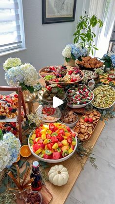 a table filled with lots of different types of food