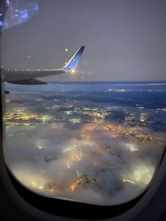 the view from an airplane window at night