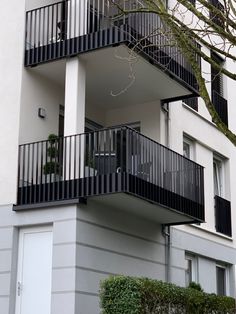 an apartment building with balconies and balconyes