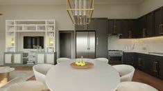 a white table and chairs in a room with black cabinets, gold chandelier