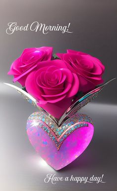 pink roses in a heart shaped vase on a gray background with words good morning have a happy day