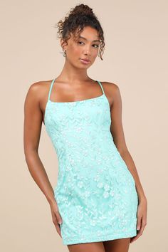 Your flirtiest heels have been begging to be paired with the Lulus Lively Sweetheart Turquoise Mesh Embroidered Lace-Up Mini Dress! Sweet floral embroidery adorns sheer mesh knit as it shapes a flattering scoop neckline supported by slender straps that lace up across the open back. The princess-seamed bodice continues into a figure-skimming bodycon silhouette that finishes with a cute mini hem. Hidden back zipper/clasp. Fit: This garment fits true to size. Length: Mid-thigh. Size medium measures Turquoise Embellished Fitted Dress, Fitted Turquoise Embellished Dress, Teal Hoco Dresses, Floral Homecoming Dresses, Turquoise Dress, Bodycon Floral Dress, Formal Dresses Short, Floral Embroidered Dress, Sweet Floral