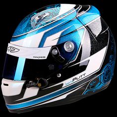 the helmet is designed to look like it has been painted with blue and white designs