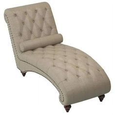 a beige chaise lounge chair with buttons on it