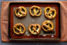 eight pretzels on a baking sheet with the words made in french