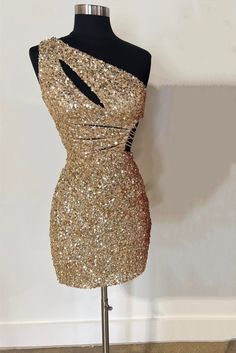 One Shoulder Gold Cutout Sequin Tight Homecoming Dress White And Gold Homecoming Dress, One-shoulder Bodycon Dress For Prom, Gold Fitted Dress With Asymmetrical Neckline, One Shoulder Gold Evening Dress For Prom, Gold One-shoulder Evening Dress For Prom Season, Gold One-shoulder Evening Dress For Prom, Glamorous Gold One-shoulder Dress For Gala, Glamorous Gold Bodycon Prom Dress, Gold Sequin Mini Dress For Prom