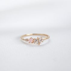 Our feminine Ria Ring features a butterfly design embellished with a pink stone and circle cut crystals on a dainty band.  Main material: Rose Gold, Rhodium, 16k Gold Plated on Brass, Cubic Zirconia Tarnish-resistant protective coating Need some jewelry inspiration? Follow us on Instagram  @statementGrey Promise Rings Danty, Dainty Adjustable Butterfly Promise Ring, Delicate Adjustable Butterfly Promise Ring, Dainty Open Butterfly Ring For Promise, Delicate Adjustable Butterfly Ring For Anniversary, Dainty Butterfly Ring For Wedding, Feminine Adjustable Wedding Rings, Dainty Pink Crystal Ring For Wedding, Cute Rose Gold Wedding Rings