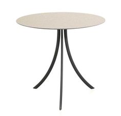 a white table with black metal legs and a round glass top on an isolated surface