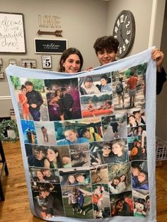 two people holding up a large photo collage