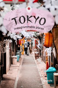 the entrance to tokyo's instagramable places is pink and white with black lettering