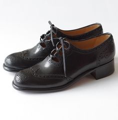 For your consideration I offer this gorgeous pair of Le Yucca's Ghillie Black Oxfords.  The high quality shoes are handcrafted by Enzo Bonafe in Italy and feature a 1.25" heel.  The shoes are marked size 37.5 equivalent to a US size 7.5 and the soles measure approximately 10 inches in length.  The shoes are brand new, remain in pristine, unworn condition and retailed for $1,100.00 USD.  Truly crafted to last a lifetime. Thank you for your interest in my listing.  I am not a dealer or reseller, all of my items come from my own personal collection.  I had the pleasure of working for years as a residential interior designer and boutique owner, effectively spending much of my time as a professional shopper.  Following a recent move, I am downsizing, sorting through a mountain of boxes and part Black Oxfords Womens, Women's Oxford Shoes, Boutique Owner, Black Oxfords, Women Oxford Shoes, High Quality Shoes, Residential Interior, Womens Oxfords, Interior Designer