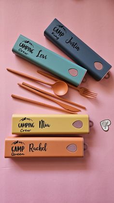 four different types of utensils on a pink surface with the words camp rachel written on them