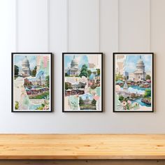 three framed pictures hang on the wall above a wooden bench