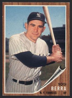 a baseball card with a man holding a bat