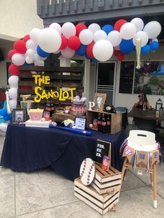 the sandlot baseball themed birthday party is set up in front of a storefront