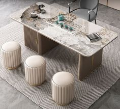 a marble table with three stools and a cell phone on the table in front of it