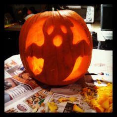 a carved pumpkin sitting on top of a table