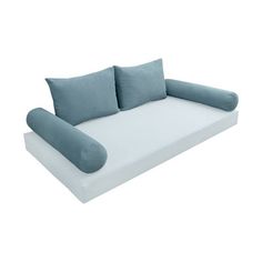 a white and blue couch with pillows on the bottom half, in front of a white background