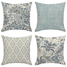 four pillows with different patterns on them, one in blue and the other in white