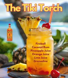 the tiki torch cocktail is served with pineapple juice and cherries