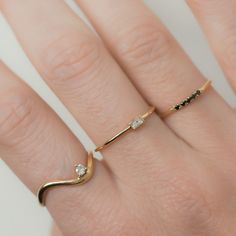 a woman's hand with a ring on it