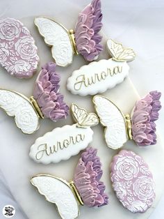 decorated cookies with butterflies and name on them