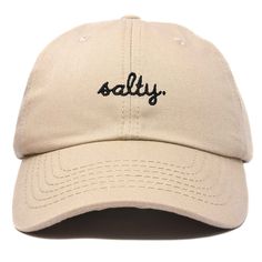 Embrace the laid-back charm of coastal living with our Salty baseball cap. Crafted from 100% cotton, our 6-panel low-crown dad cap combines comfort with effortless style. Whether you're strolling along the boardwalk, lounging on the sand, or simply running errands under the sun, our cap promises a blend of functionality and fashion that suits every beach lover's lifestyle. Measuring 11 inches in length, this unstructured cap features a fabric strap closure with a metal buckle, ensuring a secure Casual Vacation Hats With Embroidered Logo, Casual Embroidered Baseball Cap For Beach, Casual Beach Baseball Cap With Letter Print, Casual Dad Hat With Letter Print For Outdoor, Casual Cotton Trucker Hat For Vacation, Comfortable Adjustable Baseball Cap For Everyday, Casual Cream Snapback Hat For Summer, Comfortable Adjustable Baseball Cap, Adjustable Comfortable Baseball Cap