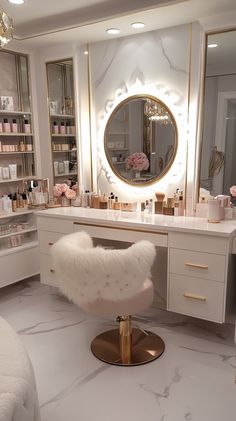 a vanity with a stool and mirror in a room that has marble flooring on it