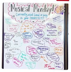 a white board with writing on it that says musical monday currently what band or song is your favorite?