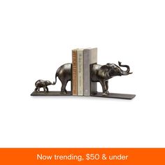 an elephant bookend is shown with the words now trending, $ 50 & under