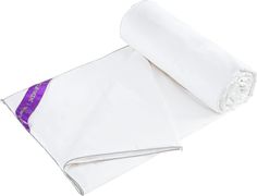 two white blankets folded on top of each other with a purple ribbon around the edges