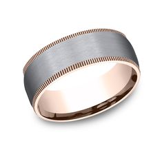 a wedding band that is grey and gold