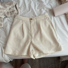 High Waisted White Shorts Size Small Material Is Thick And Nice Kind Of Cream Color Gold Button Detail From H&M So Flattering Basically Brand New Good To Dress Up Business Casual Going Out True To Size Princess Polly Revolve Isabelles Cabinet Cotton Button-up Bottoms For Day Out, Casual Button-up Workwear Shorts, Trendy Solid Shorts With Button Closure, Trendy Solid Color Shorts With Button Closure, White Solid Color Shorts, Cotton Shorts With Buttons, High Waist Cream Shorts For Work, High-waisted Cream Shorts For Work, Summer Beige Bottoms With Button Closure