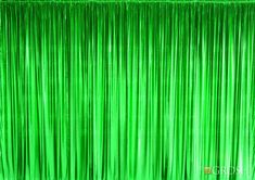 a green curtain that is very close to the ground