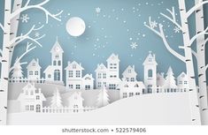 paper cut winter scene with houses and trees