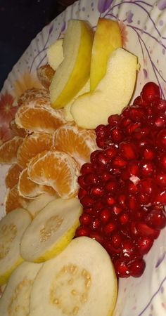 the fruit is cut up and ready to be eaten on the plate with other fruits