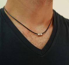 "Men's Necklace - Men's Silver Necklace - Men's Vegan Necklace - Men's Jewelry - Men's Gift - Boyfriend Necklace - Guys Jewelry  - Guys Gift Looking for a gift for your man? You've found the perfect item for this!  Meet your new favorite pendant chain, this necklace is everything you need to step up your style. The simple and beautiful necklace features  black fabric chain set with 3 silver plated beads. Length: 18.9\" (48 cm). Need a different length just write it to me in the \"message to the Simple Black Choker, Mens Choker Necklace, Men Choker, Mens Bracelet Set, Boyfriend Necklace, Mens Leather Necklace, Mens Chain Bracelet, Mens Bracelet Silver, Black Choker Necklace