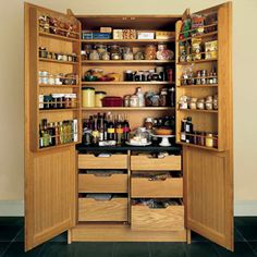 an open pantry with lots of spices and condiments