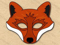 a red fox mask with black eyes