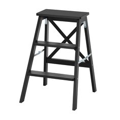 a black wooden stool on a white background