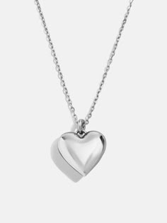 Design a special memento to represent those closest to your heart. The Puffy Heart Sterling Silver Custom Pendant Necklace features a three-dimensional heart charm with the option to add 1-4 engraved letters of your choosing. Add the initials of each of the members of your family, you and a few loved ones, or even just your own - the options are endless. Better yet, this piece is crafted with sterling silver, meaning it'll last you a lifetime. Heart Necklace Locket, Big Heart Necklace, Engraved Letters, Silver Meaning, Custom Pendant Necklace, Puffy Heart Necklace, Silver Heart Jewelry, Heart Necklace Silver, Work Necklaces