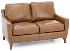 a brown leather couch sitting on top of a white floor